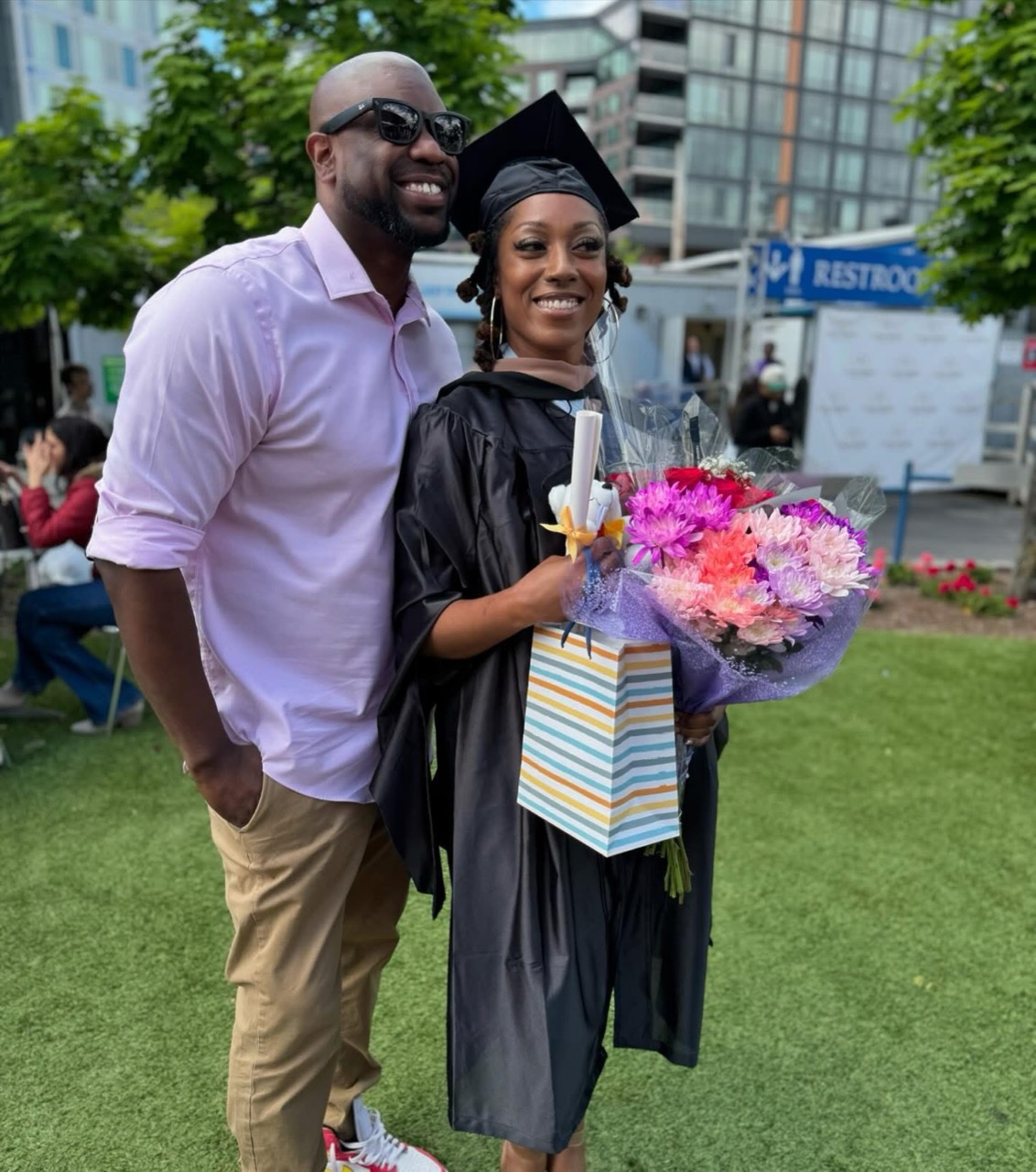 Rick Grant with a family member at graduation.